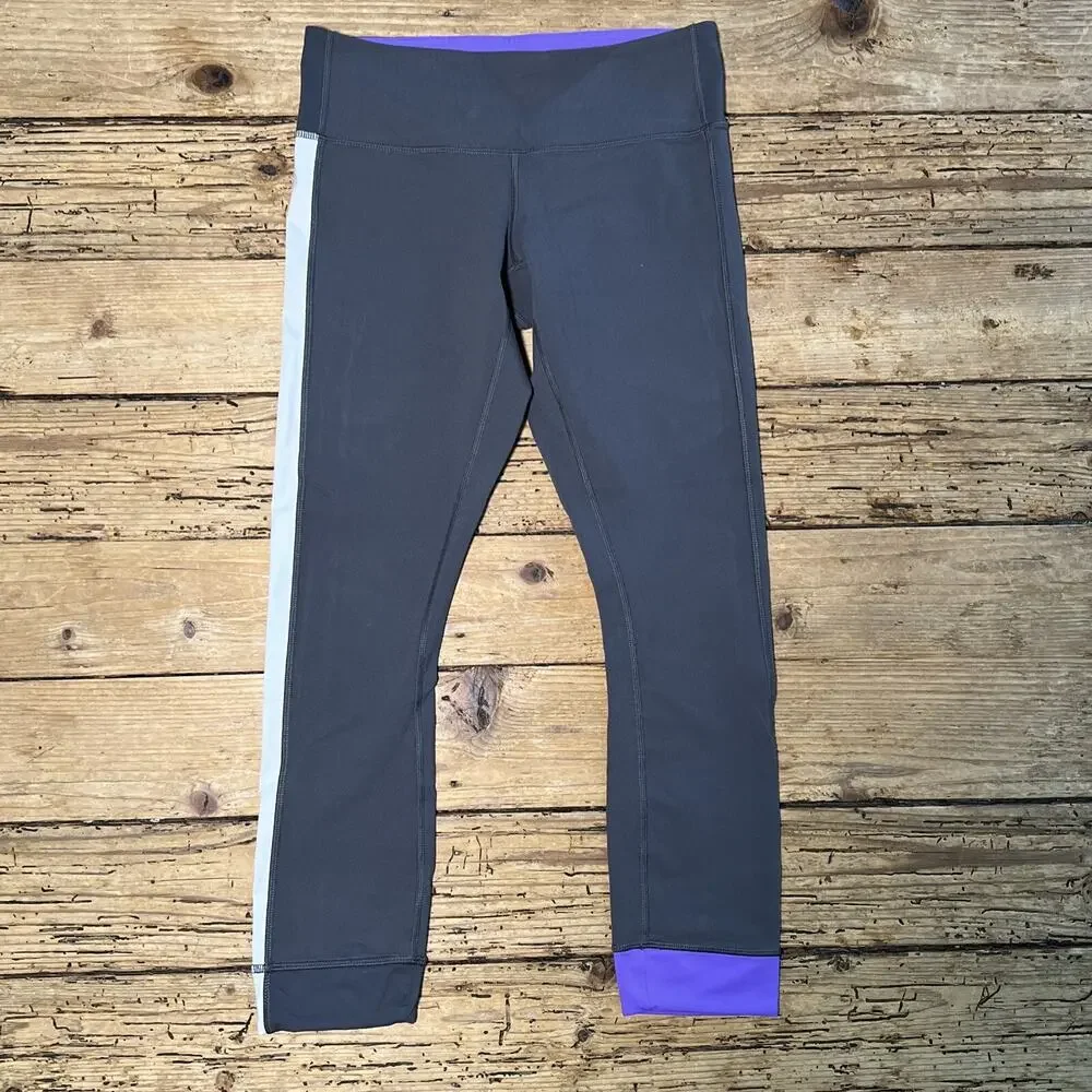 Lululemon Amped Crop Soot Light/ White/ Power Purple Size 4 NWOT